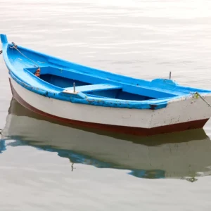 Anchored abandoned boat