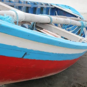 Close up of red,blue and white boat