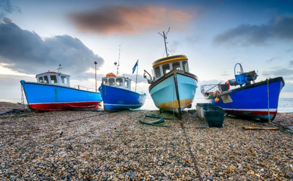 Blue fishermen boats ashore